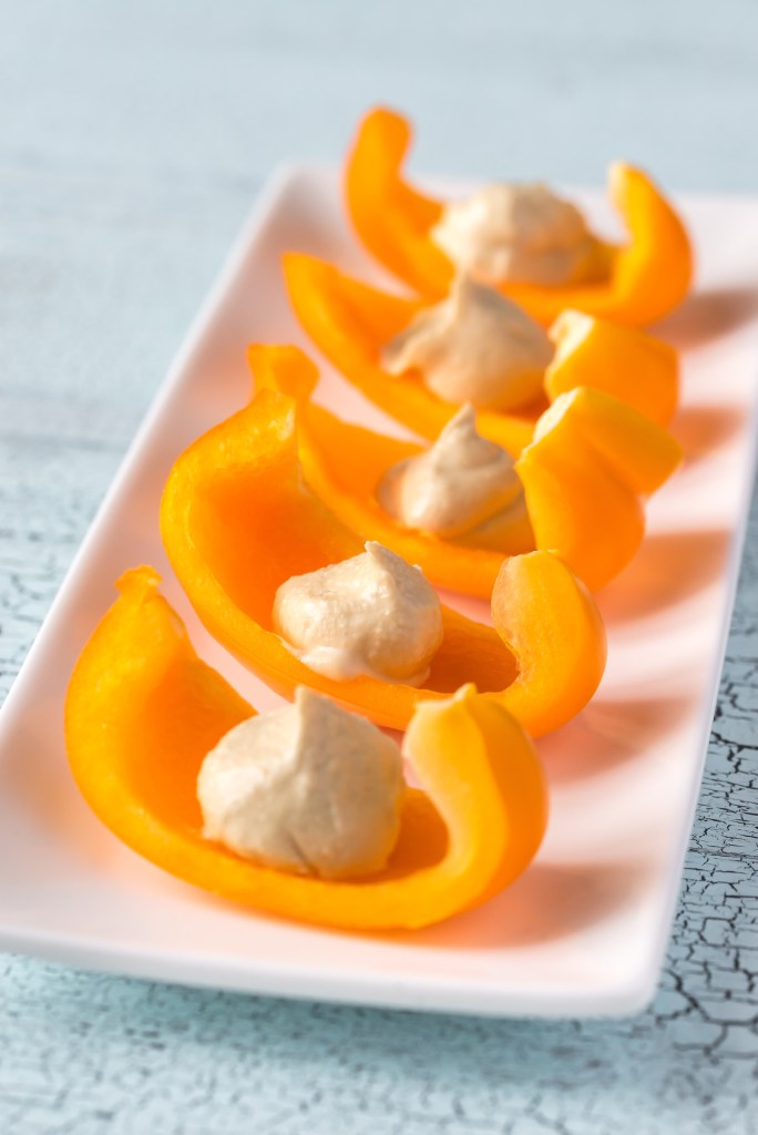 Food For Mood 3:Slices of yellow bell pepper with hummus