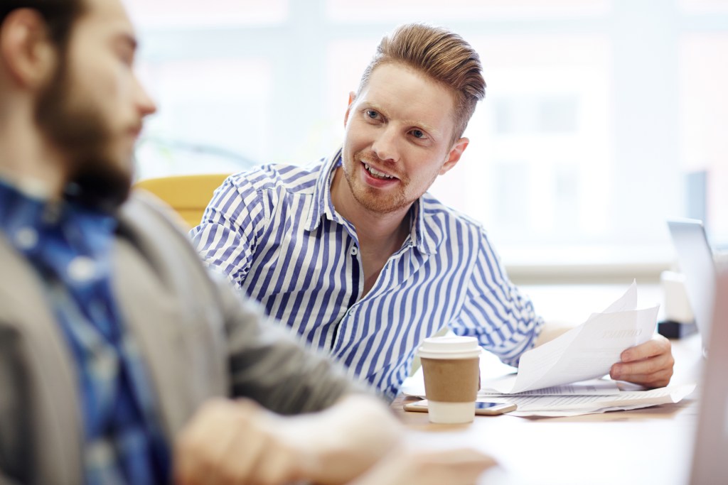 Engineer Jeremy with his manager having a conversation about mental well-being in a startup environment. As Jeremy gets better at formulating what he needs, his manager has learned to make him feel safe when talking about his depression journey. Health-privacy paradox solved.
