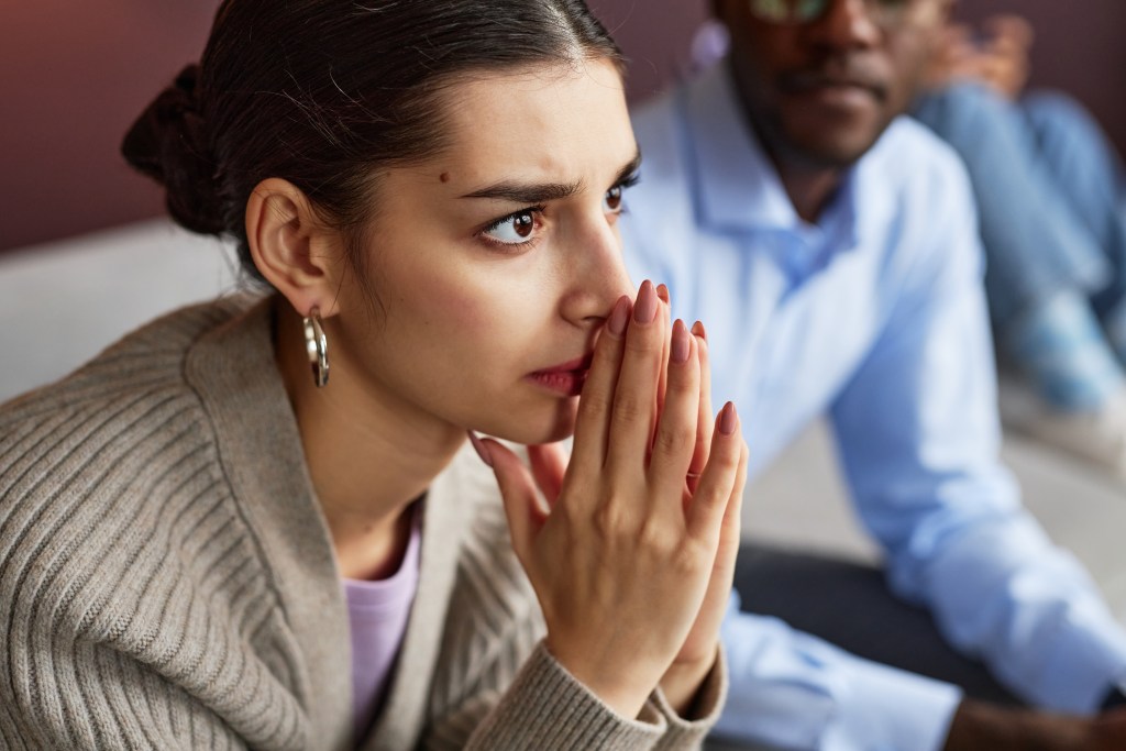 Is Intuition the Highest Form of Intelligence? Emotional woman listening to advice of mentor