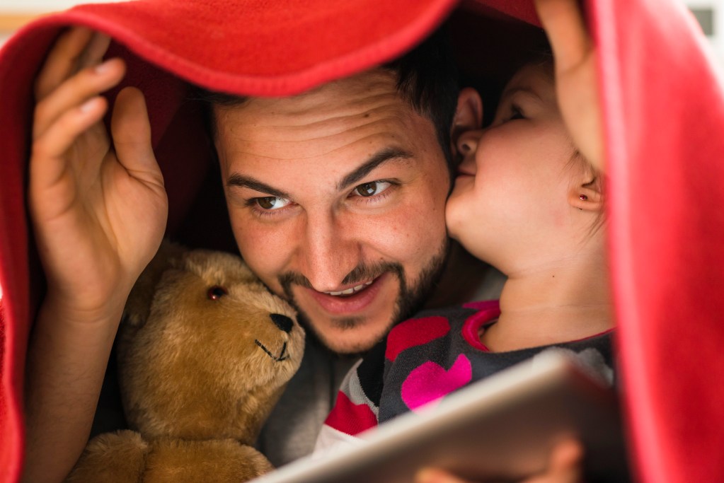 Beyond the Winnie-the-Pooh Mental Illness Theory: Father, daughter and Pooh under blanket