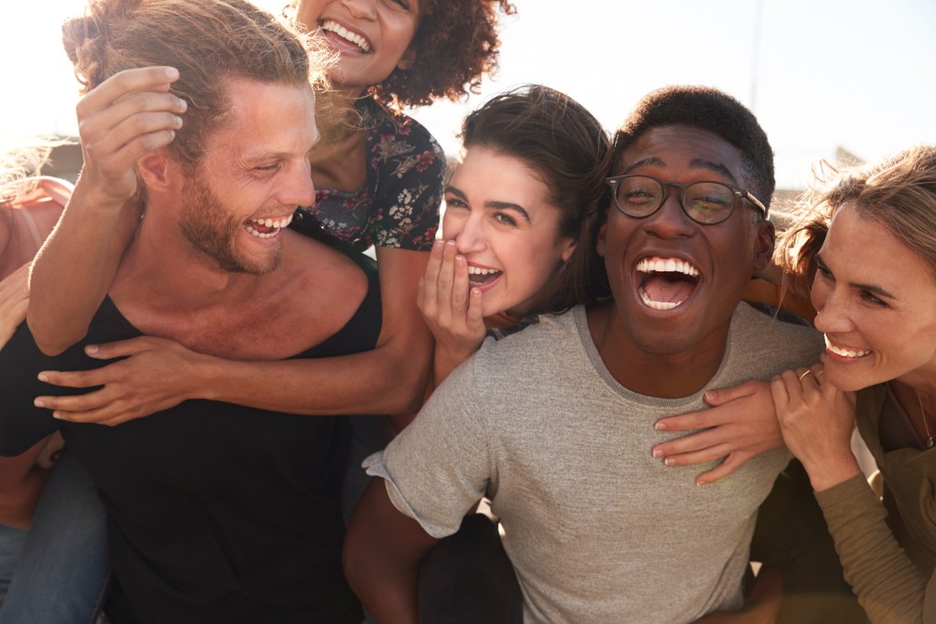 Things to talk about with your crush: Friends having fun outdoors together