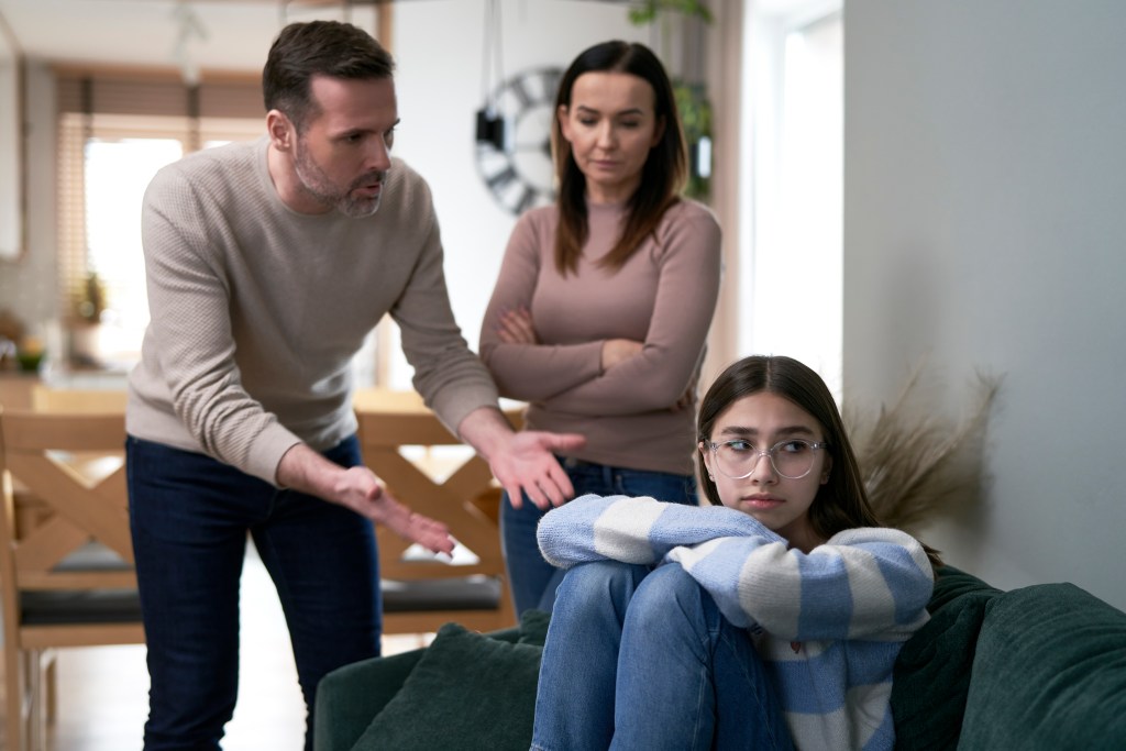 Teenager being berated by her parents and thinking "I hate my family"