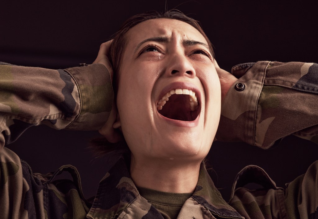 Healing from trauma quotes: Female Veteran struggling with PTSD