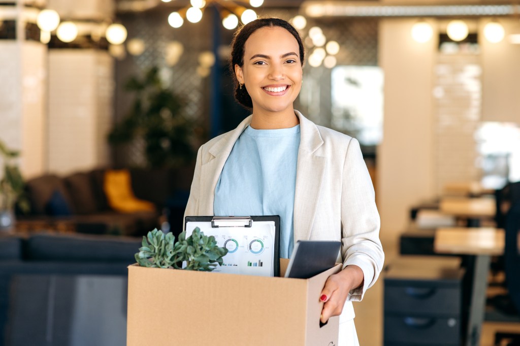 Should I quit my job? Confident woman leaving her job gracefully