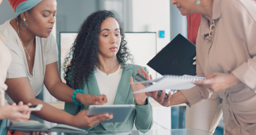 Multitasking high-functioning business woman risking burnout for not accepting help