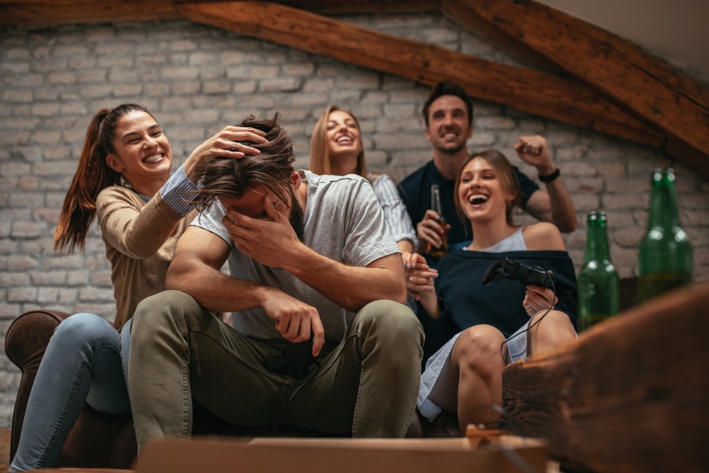 Young man at a party suddenly feeling unwell due to a brain injury he thought was "fine"