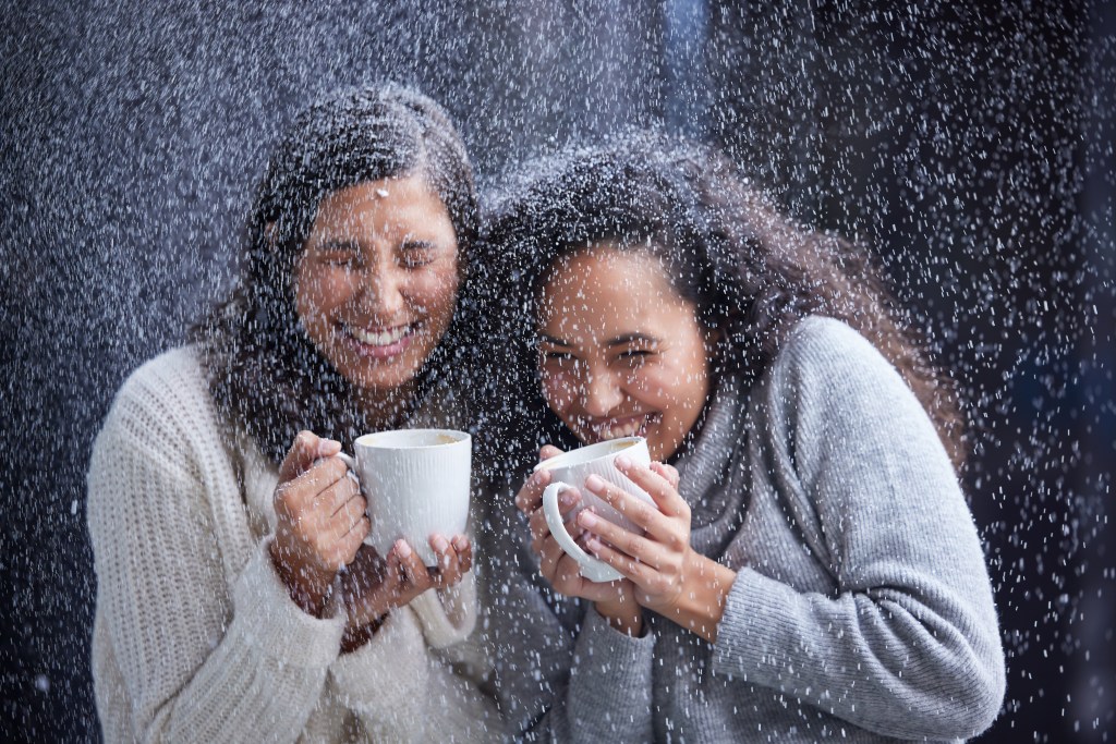 Functional beverages as a beloved shared ritual: friends drinking mushroom coffee in the snow