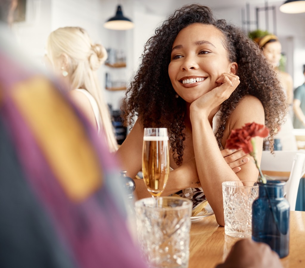 How to fall in love: Woman on a date, showing openness and paying attention