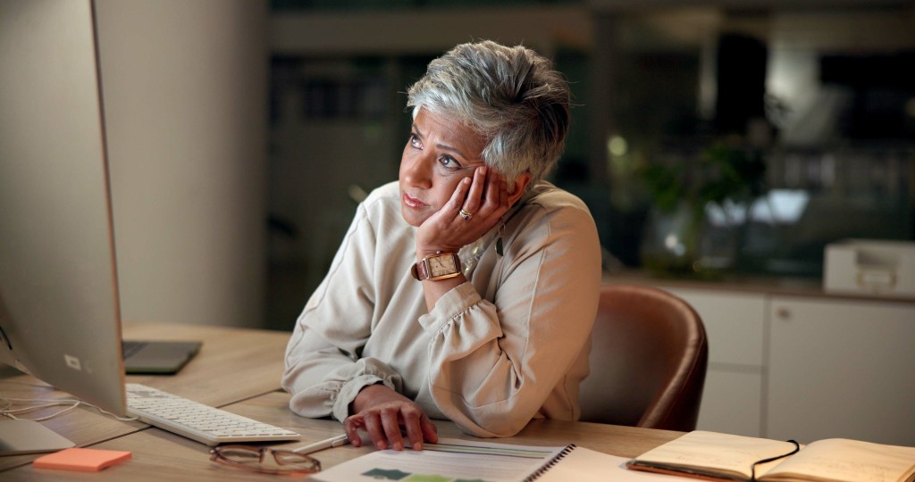 Senior manager staring into the void: struggles a software for emotional health could easily mitigate.